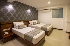 Ceyloni City Hotel - Chambre