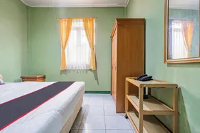 Capital O 93949 Hotel Popuci By Pupa Hospitality - Room