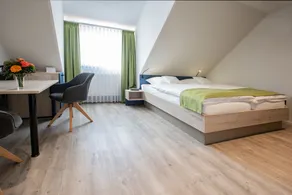 CAESARO Hotel & Pizzeria - 20 Jahre Familienunternehmen - Camera