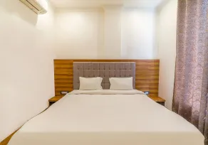 Fabexpress Global Inn New - Room