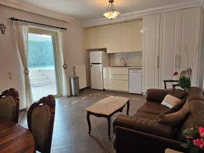 Guest apartment within a villa in Lagonissi - Living area