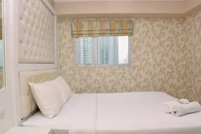 Nice and Homey 1BR at The Wave Kuningan Apartment By Travelio - Zimmer