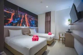 Triizz Hotel Semarang - Zimmer
