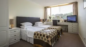 La Collinette Hotel, Cottages & Apartments - Chambre