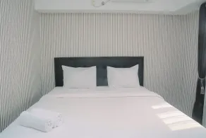 Homey and Big Studio Apartment at The Wave Kuningan By Travelio - Værelse