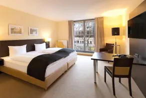DORMERO Hotel Altes Kaufhaus Lüneburg - Chambre