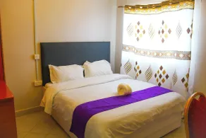Holiday Premier Hotel - Zimmer