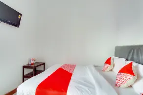 Orange inn RedPartner Madiun - Room