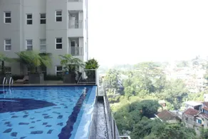 Direct Access to Pool 2BR Apartment at Parahyangan Residence By Travelio - Pool