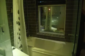 64 Inn Hotel - Badezimmer