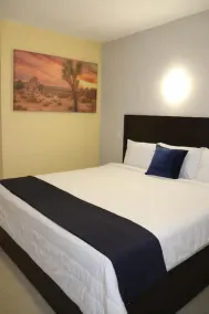 Capital O Hotel Jazuli - Chambre