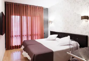 Hospedium Hostal Un Punto Chic - Chambre