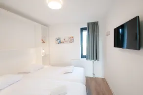 Gemütliches Ferienhaus mit Garten und Terrasse | Nah am Strand | Haustiere sind willkommen - Zimmer