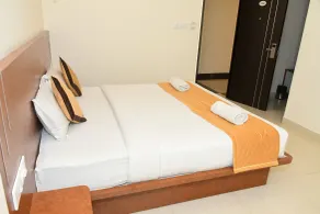Sai Vihaar Inn & Suites - Quarto
