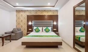 Treebo Premium Grand Legacy Elite with Roof Top Cafe - Room