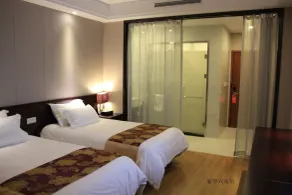Baolong Homelike Hotel Changxing Branch - Room
