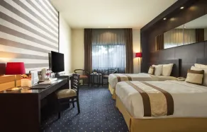 Swiss-Belhotel Silae Palu - Chambre