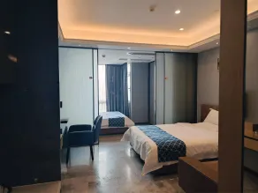 Green lemon tree International Apartment Beijing Road Jiedeng Metropolis Store - Habitación
