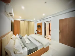 Hotel Grand Aana Inn - Zimmer