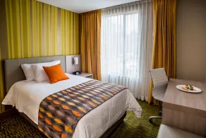 Hotel Plaza Suites - Chambre