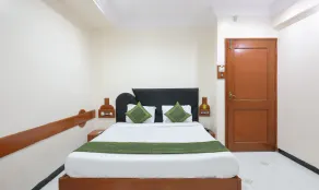 Treebo Omni Palace - Habitación