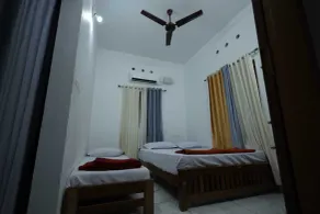 Wildmist Homestay Erumely - Chambre