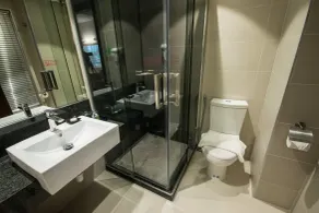 Hotel Labuan Point - Badezimmer