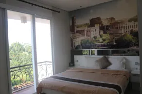 RedDoorz at Tirta Mansion Paramount Gading - Room
