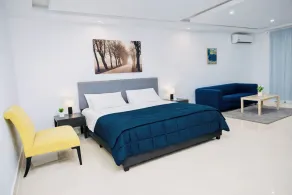 Tris Estates Hotel & Suites  - Værelse