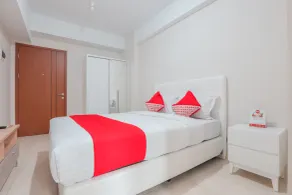 Apartemen Green Lake View Ciputat by GFROOM - Chambre