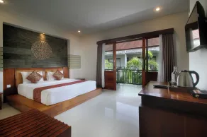 Putri Ayu Cottages - Habitación