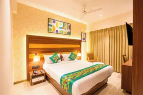 Treebo Premium Hotel Merrit - Camera
