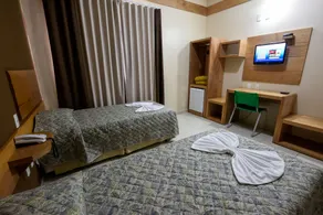 Prisma Plaza Hotel - Room