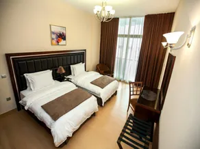 Xclusive Maples Hotel Apartment - Chambre