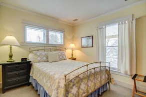 Captain's Cottage Suites - Chambre