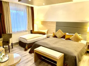 Boutique Hotel Goldene Henne - Chambre