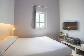 Norn Yaowarat Hotel - Vue de la chambre