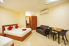 Hotel Rajdhani Inn & Suites - Quarto