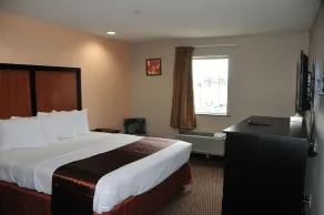 Paradise Inn & Suites - Chambre