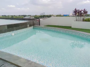 Comfy and Minimalist 1BR Patraland Urbano Apartment near Bekasi Station By Travelio - Pool
