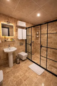 Whitestone Hotel - Badezimmer