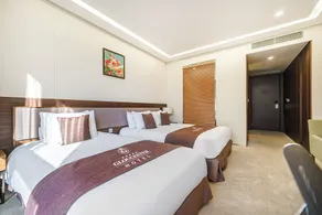 Gloucester Hotel Incheon - Chambre
