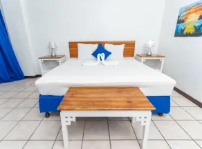  Sand And Tan Beach Hotel - Chambre