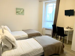 Hôtel des quatre saisons - Værelse