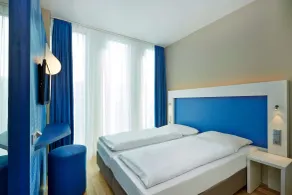 H2 Hotel München Messe - Vue de la chambre