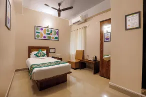 Treebo Urban Oasis Inn, Sixmile - Chambre