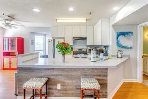 1 Mi to Beach: Golf Glenn Villas Condo w/ Pool - Interior