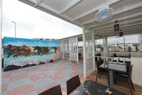 Hotel Amulya Relax Inn - Outdoor dining