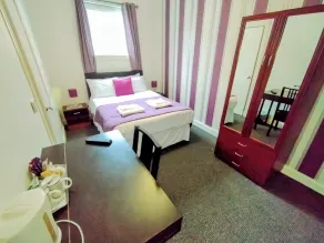 OYO Gin House Hotel - Værelse