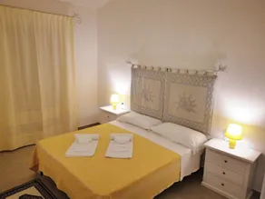 Die fantastische Residenza Badus mit 2 Schlafzimmern für 6 Personen - Kind - Zimmer